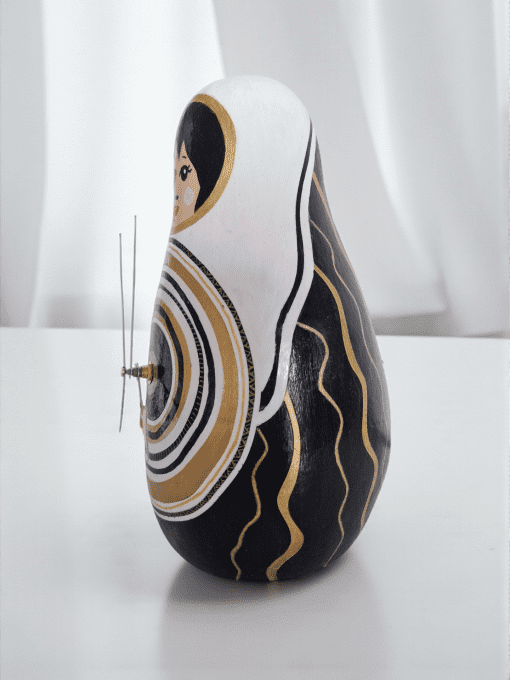 Horloge "Poupée Gigogne"